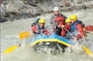 Group rafting in the Alps